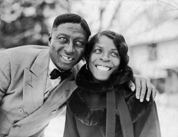 Lead Belly pictured with his wife, Martha Promise Ledbetter, in 1935, after he had been discovered for his classic song, Goodnight, Irene.