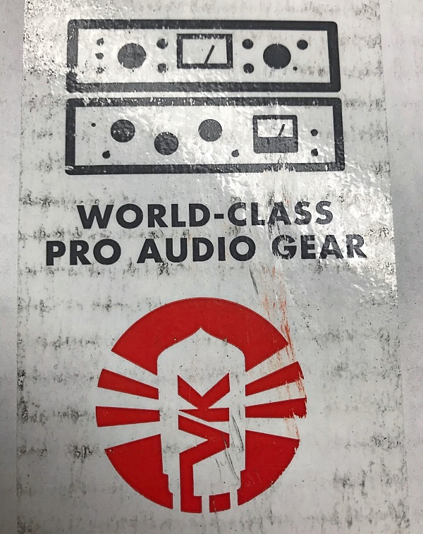 The tape on Victor V. Gurbo's Copperphone microphone box - "WORLD-CLASS PRO AUDIO GEAR" making it clear that the contents were valuable.
