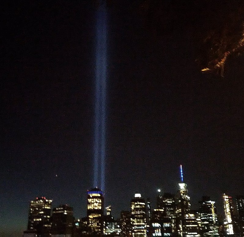Photo of the 9-11 memorial lights taken from the Brooklyn Heights Promenade on September 11, 2020.