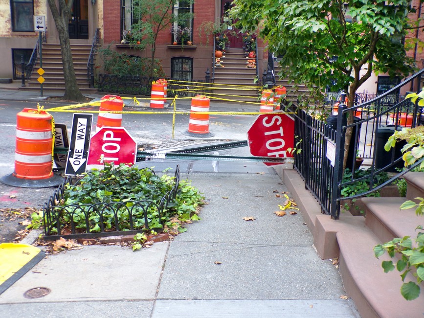 A double-stop sign down story:  two fallen downed stop signs on Brooklyn Heights's Garden Street.