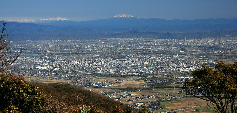 Photograph of Ōgaki City from Yoro Mountains - Credit:  Alpsdake, CC BY-SA 3.0 https://creativecommons.org/licenses/by-sa/3.0, via Wikimedia Commons