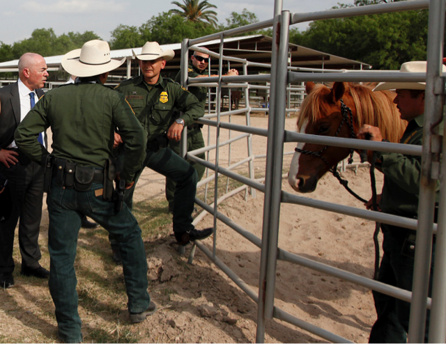 Alejandro Mayorkas talking to members of the Rio Grand Valley Sector's Horse Patrol unit in 2015.