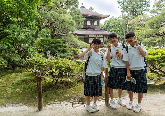 Three Japanese school girls in Arashiyama - photo credit to Michelle Maria from Pixabay