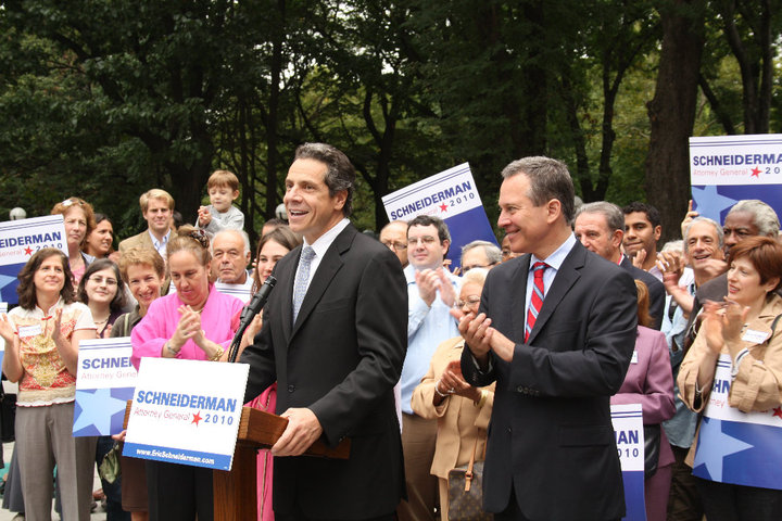 Then-Attorney General Andrew Cuomo endorsing Eric Schneiderman for the same office in 2010.  Photo credit:  "Eric Schneiderman Endorsed by Andrew Cuomo for NYS AG" by citizenactionny is licensed under CC BY-SA 2.0