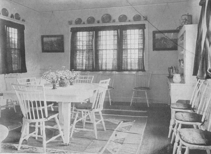 Image of a white dining room from "Furnishing the Room of Good Taste" (1920)