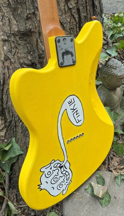 Back of a Big Joe Williams-inspired 9 string guitar.  Guitar built by Victor V. Gurbo and painted by Andy Finkle.
