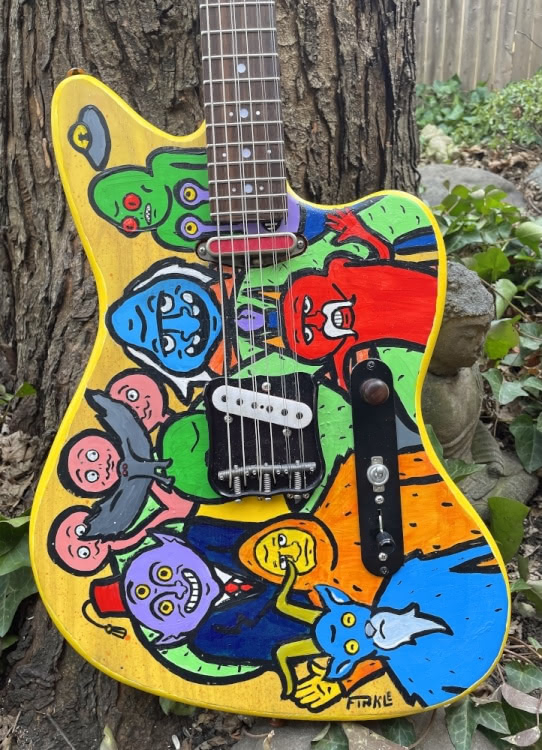 Voccoli Guitars 9-string guitar, painted by Andy Finkle.