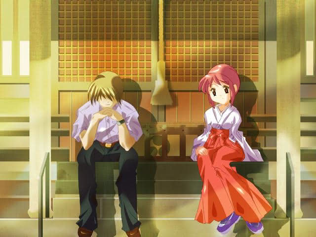 Haruki and Minori, the main characters of May Sky, sitting on the steps of the shrine where most of the visual novel's events take place.