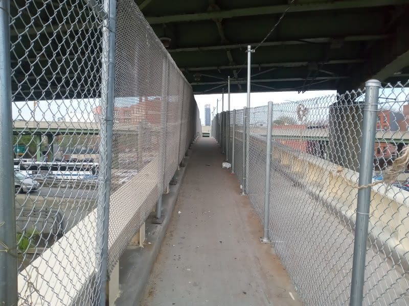 Long shot of the longest span of the Hamilton Avenue Footbridge from its Red Hook side - under the shadow of the BQE overpass.