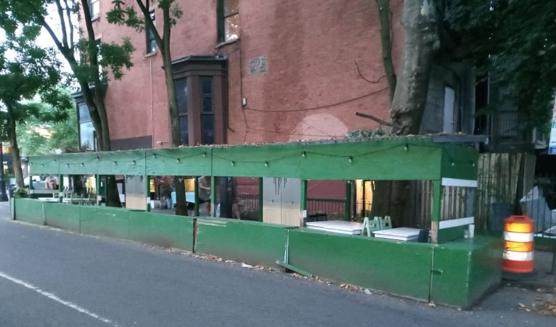A dirty outdoor dining shed just off Montague Street in New York City's scenic Brooklyn Heights.