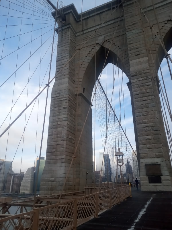Photo through the first tower of the Brooklyn Bridge (from the Brooklyn side).