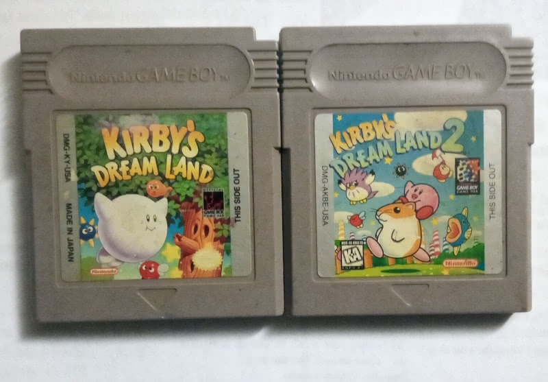 SIde-by-side original copies of Kirby's Dream Land and Kirby's Dream Land 2 for Game Boy.