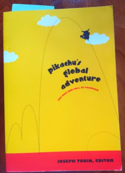 A copy of Pikachu's Global Adventure, published by Duke University Press (2004).