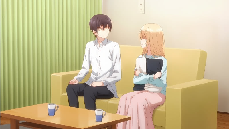 Amane and Mahiru talk on a couch in Amane's apartment in the end credits of The Angel Next Door Spoils Me Rotten Anime.