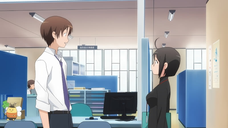Lucy having a conversation with a coworker on her first day at work in the Servant X Service anime.