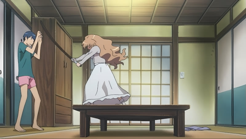 Taiga, in a nightgown attacking Ryuji, in his boxers, with a kendo sword in the first episode of Toradora.