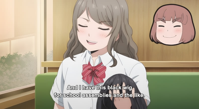 Tsumugi shows off a black wig she uses at school to hide her dyed hair in episode 7 of Ippon Again!