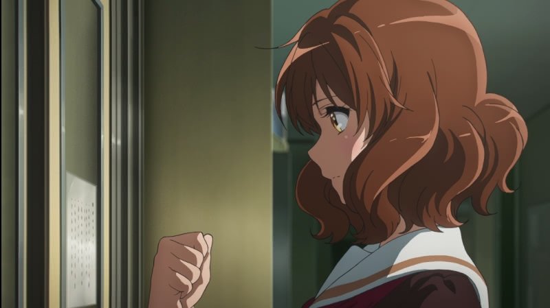 Kumiko Oumae knocks on a door in her school's hallway in the third and final season of the Sound! Euphonium anime TV series.