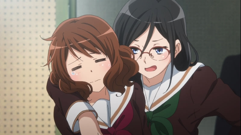 Asuka Tanaka throwing her hand around Kumiko Oumae, who looks uncomfortable, after discovering that Kumiko was hiding the fact that she played the euphonium