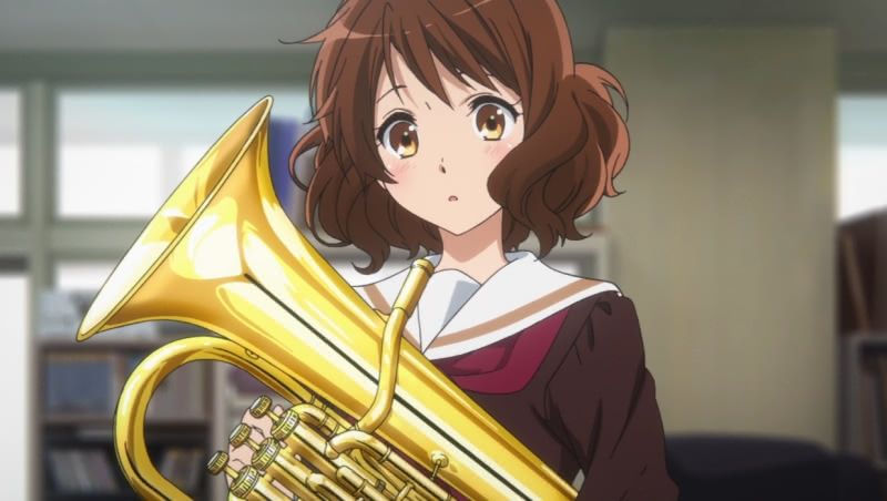 Kumiko Oumae holding a gold euphonium in the first season of the Sound! Euphonium anime.