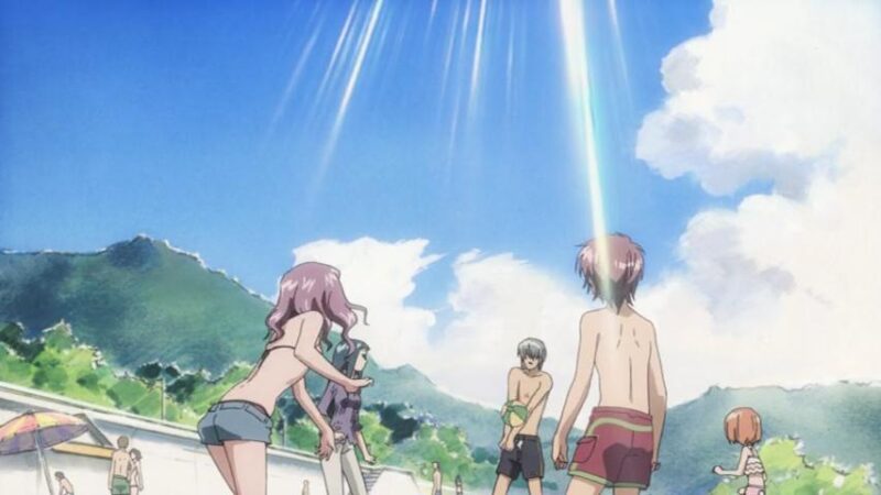 Hiro receives a beach ball after Touko hit it to him. Shouko is between Touko and Hiro while Tetsu and Karada are on the other side. Everyone is wearing a swimsuit except Shouko.