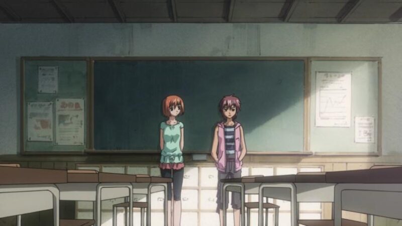 Karada and Tetsu stand next to each other in an empty classroom in Living for the Day After Tomorrow.