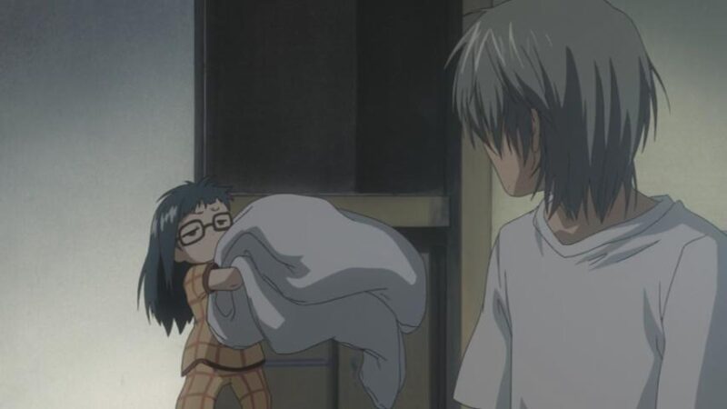 Child shouko pleads with Hiro for help as she tries to lift her bedding and put it in the closet.