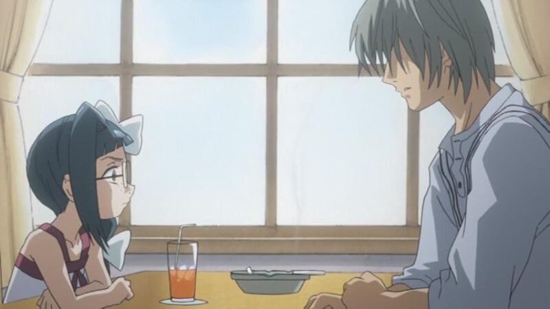 Shouko and Hiro have a tense conversation sitting across from each other at Touko's cafe.