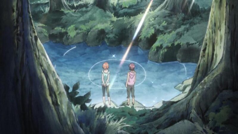 Karada and Tetsu look at a spring while a sun beam comes through the trees and lands on the water.