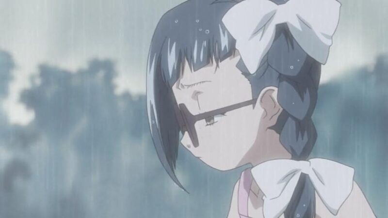 A sad-looking little Shouko walking in the rain.